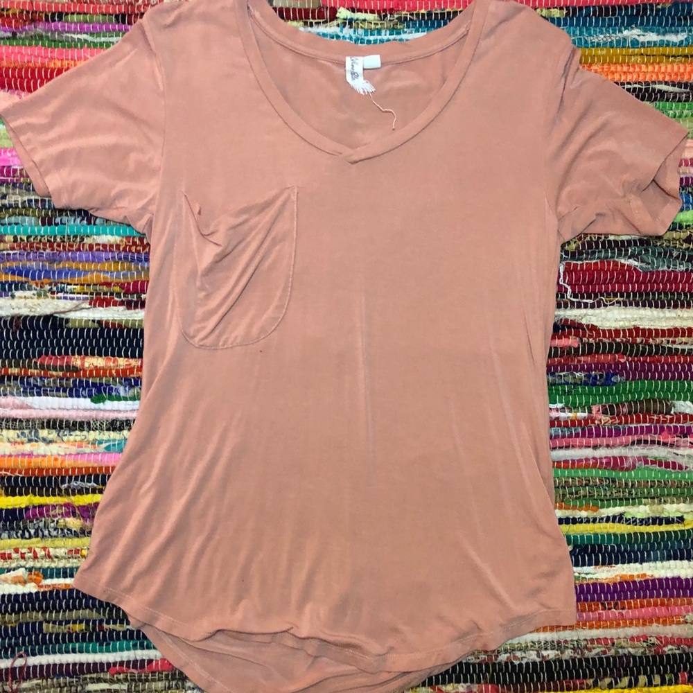 Peach colored t-shirt with pocket